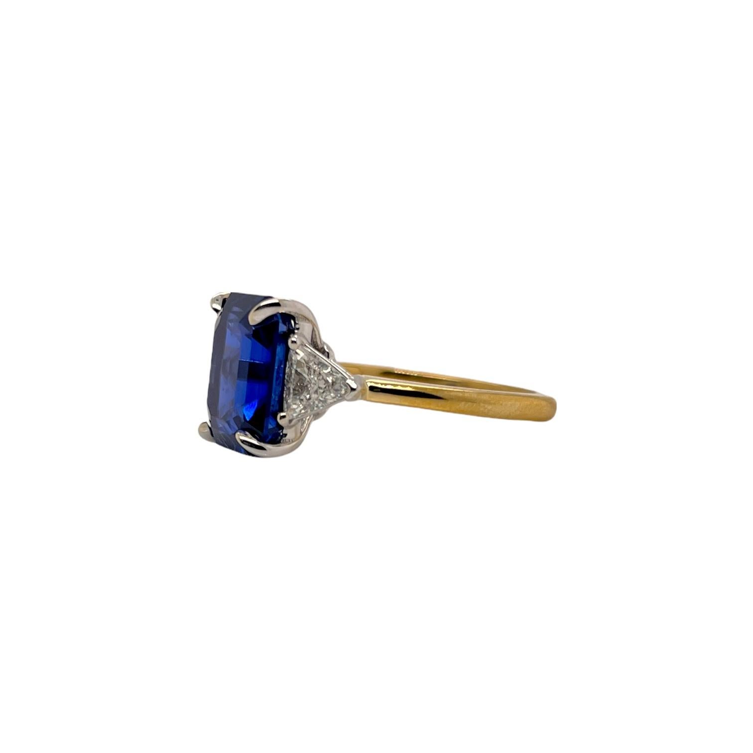 Contemporary GIA Certified Emerald Cut Sapphire & Diamond Three Stone Ring in 18K Gold For Sale