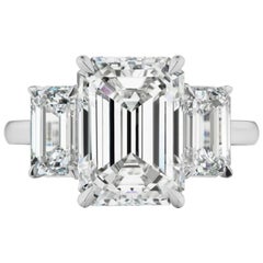 GIA Certified Emerald Cut Three Stone Platinum Ring