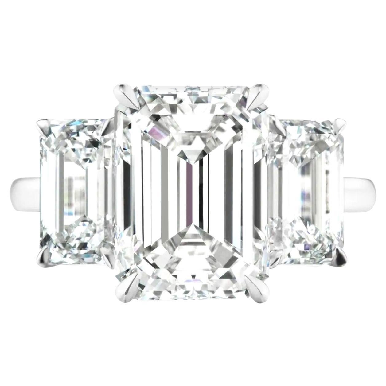 GIA Certified Emerald Cut Three Stone Platinum Ring