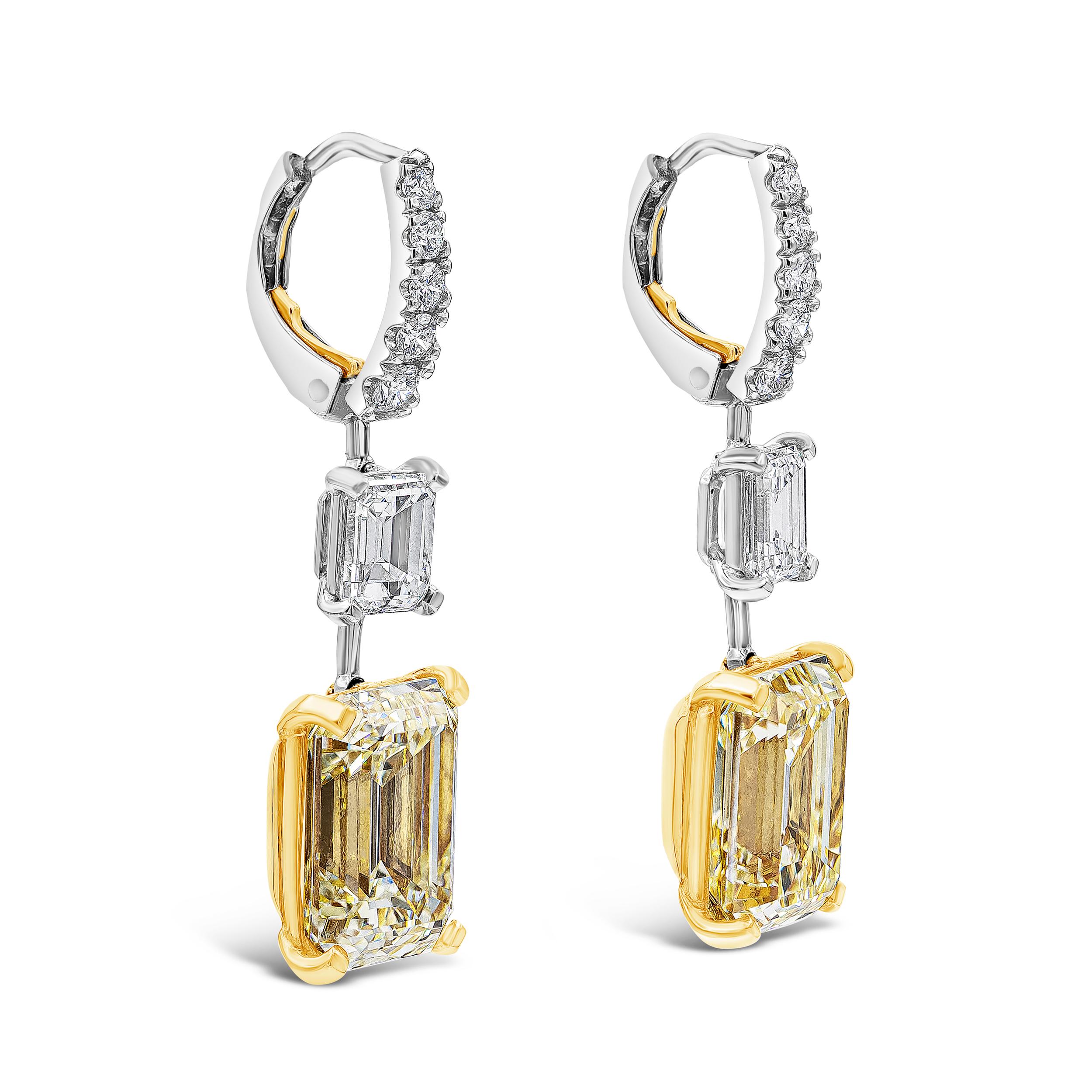 Well crafted and vibrant pair of dangle earrings featuring GIA certified yellow and white emerald cut diamonds set on a four prong 18k rose gold and platinum basket respectively. Suspended on a cluster of white diamonds, 10 pieces in total, weighing