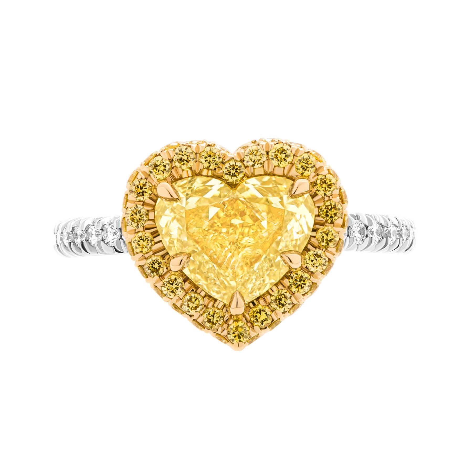 Engagement Ring in 18k Yellow Gold & Platinum  950 
Center stone: 2.01ct Natural Fancy Yellow Even VS2 Heart Shape Diamond GIA#6224501013 
Size:6
Total carat eight of Pave Stones:0.73ct
Featuring diamond shank, diamond stage & double edge halo
