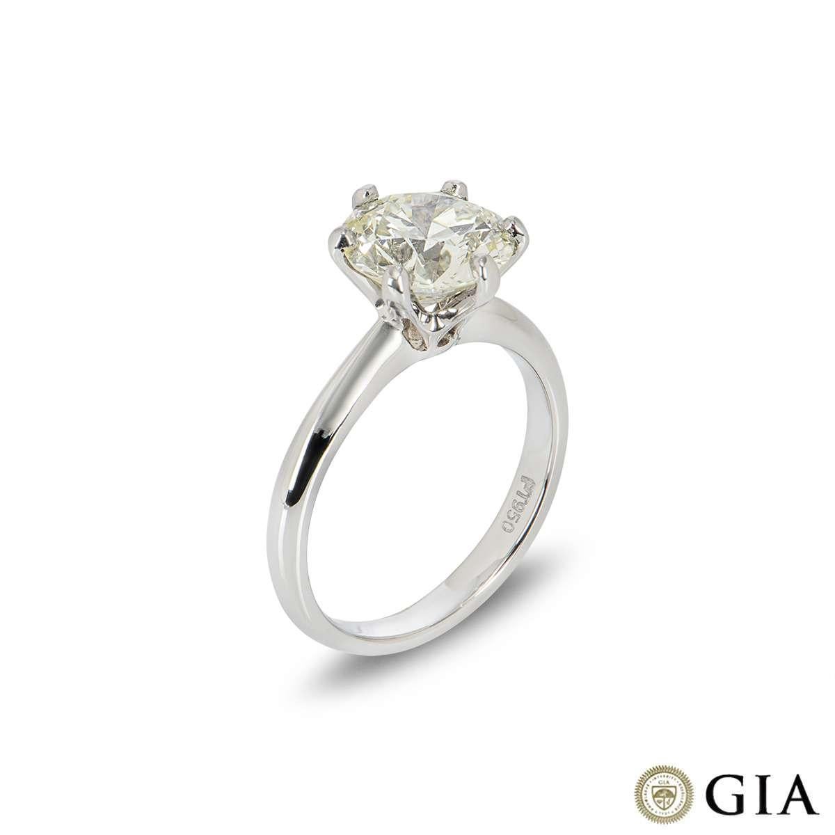 A single stone round brilliant cut diamond ring set in platinum. The 2.71ct round brilliant cut diamond is N colour and VS1 clarity. The single stone is set within a six claw platinum mount  which is currently a UK size M/ US size 6.25/ EU size 52