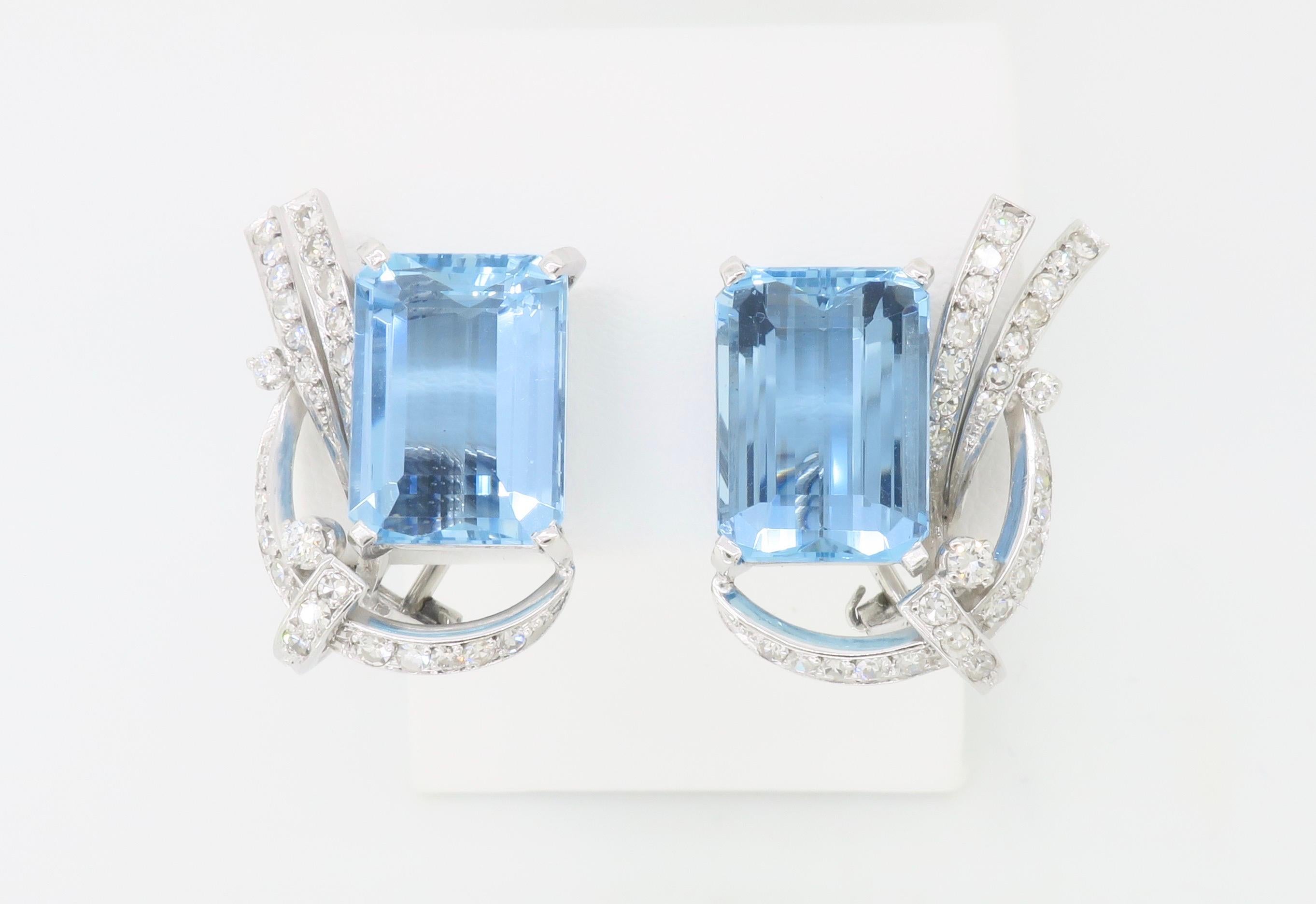 Pristine GIA Certified Aquamarine & Diamond omega back earrings made in Platinum & 18k white gold. 

Gemstone: Aquamarine & Diamond
Gemstone Carat Weight: Approximately 6.82ct & 6.45ct 
Gemstone Certification: GIA 6223671862
Diamond Carat Weight:
