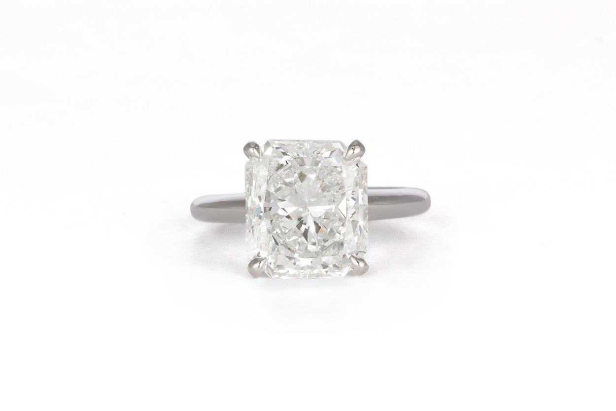 We are pleased to offer this GIA Certified 14K White Gold & Radiant Diamond Solitaire Engagement Ring. This beautiful ring features a GIA certified & laser inscribed 5.05ct F/VS2 Radiant cut diamond set in a 14k White Gold 4 prong solitaire setting.
