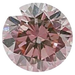 Diamante redondo natural de 0,11 ct de color rosa anaranjado parduzco certificado por el GIA