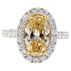 GIA Certified Fancy Brownish Yellow Oval Diamond 4.06 Carat TW Cocktail Ring