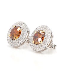 GIA Certified Fancy Deep Orange Round Diamond 6.35 Carat TW Gold Earrings