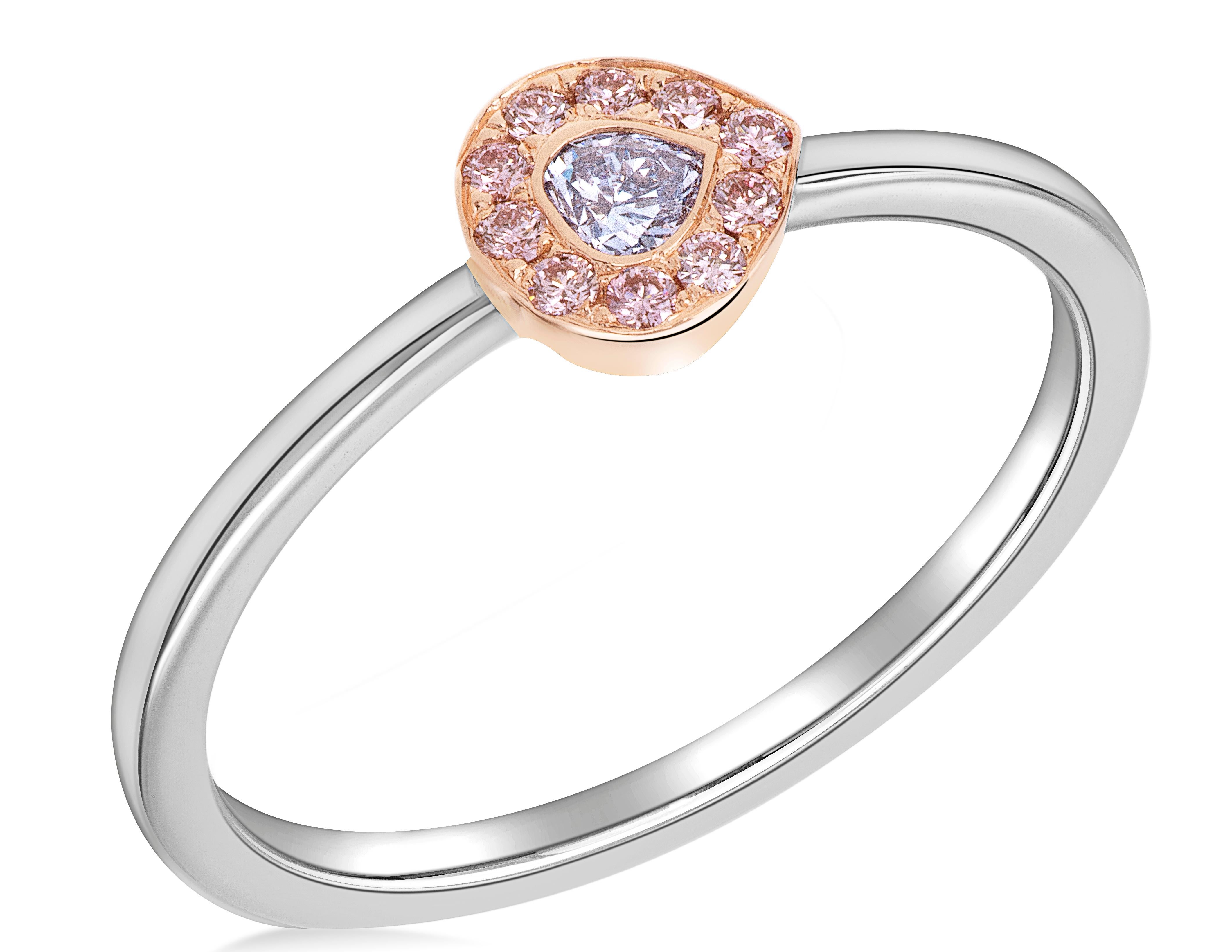 Indulge in the enchanting beauty of this stackable ring featuring a Modified Heart Shape, Fancy Gray Blue diamond with GIA #2211437497. The mesmerizing diamond takes center stage, captivating with its unique color and shape.

Accompanying the fancy