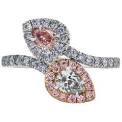GIA Certified Fancy Intense Pink and Fancy Light Blue Pear Shaped Bypass Ring