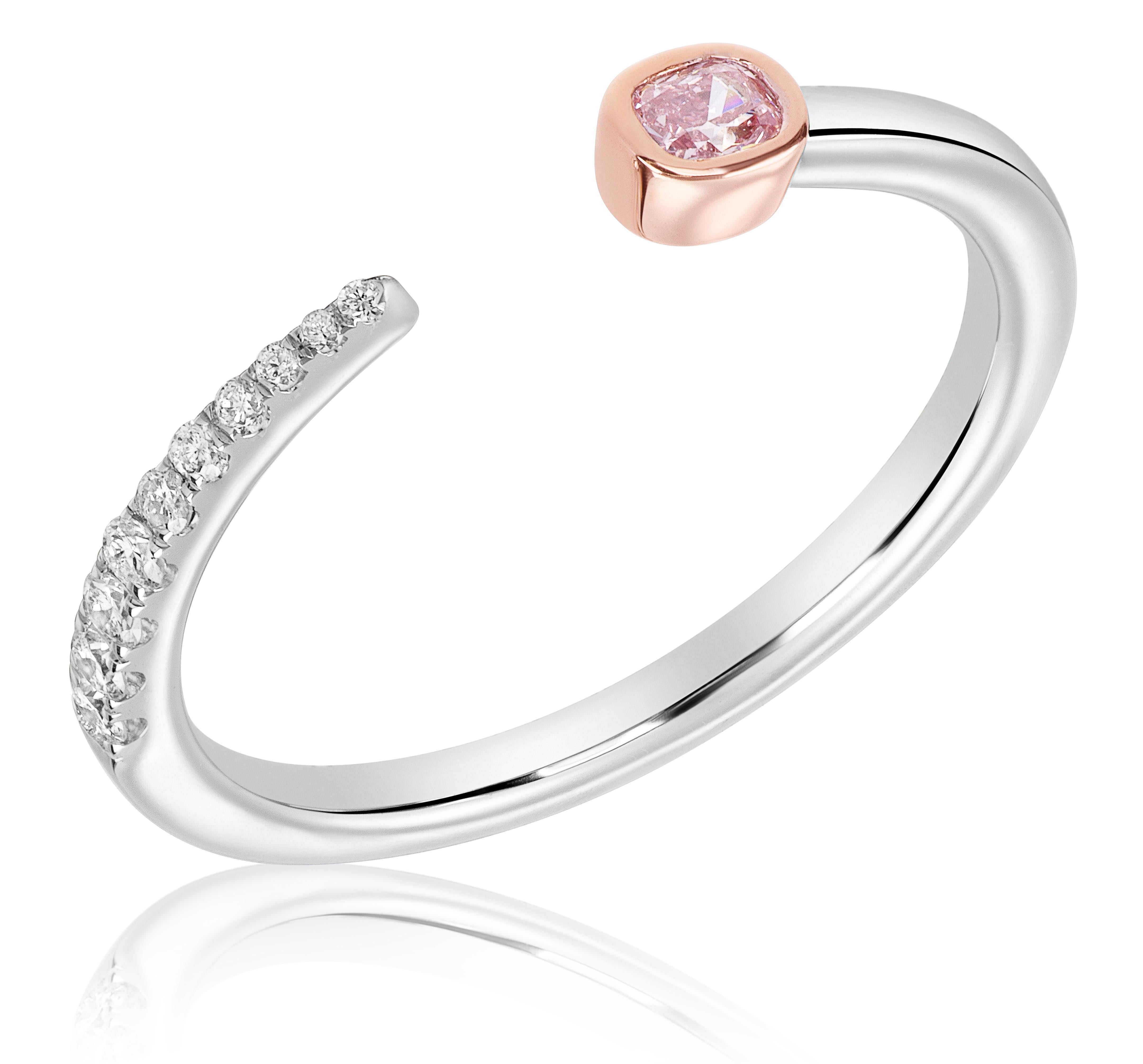 Ring (stackable) featuring a 0.08 carat Radiant, Intense Pink, GIA #2215437490. Accented with 8 white diamonds weighing .09 carats. Set in 14k rose and white gold. Stock size in 6.5, which can be altered based on sale. 