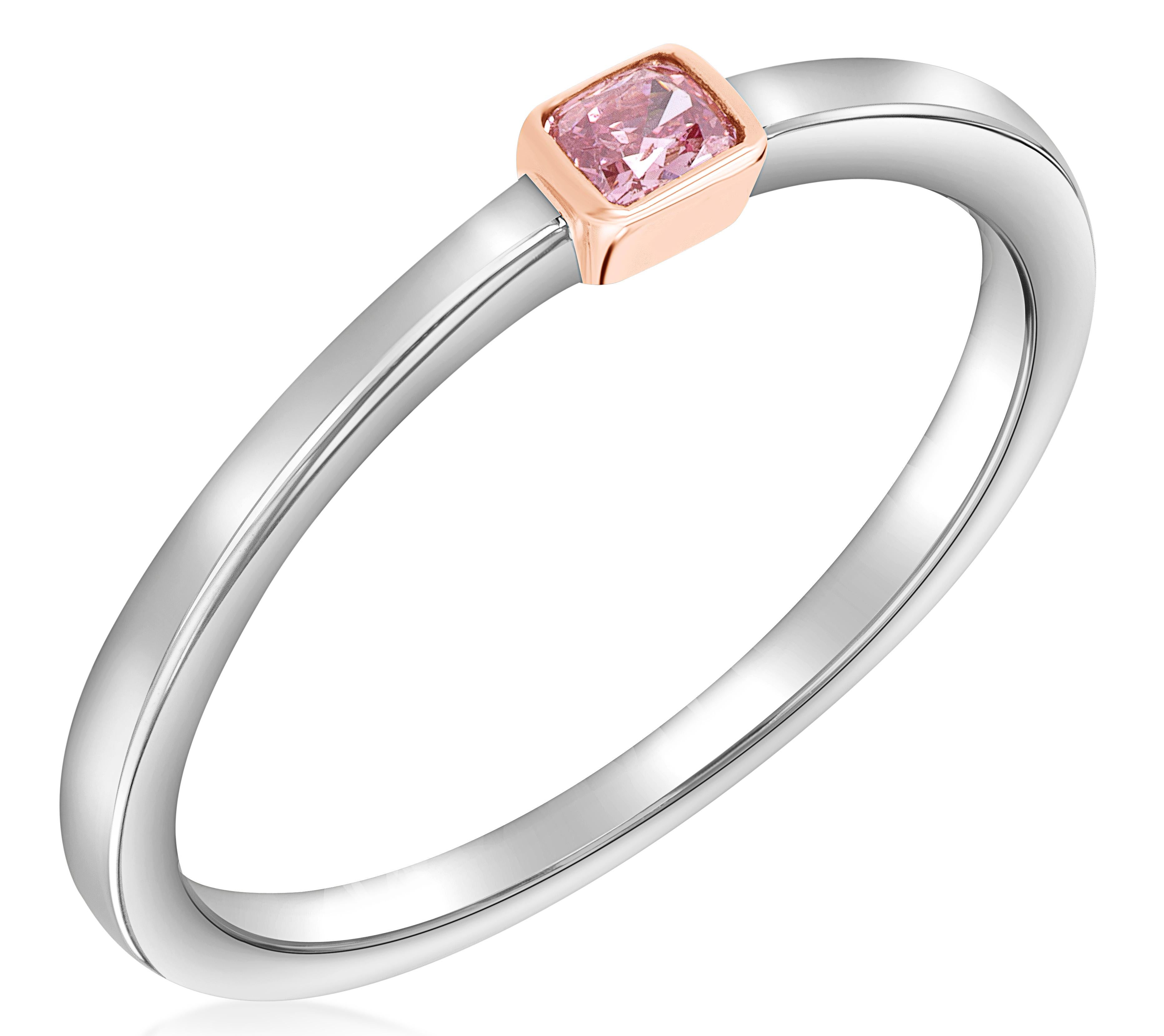 Stackable ring featuring a 0.10 carat fancy intense pink radiant. GIA#:5211437494. Set in 18k rose and white gold.

