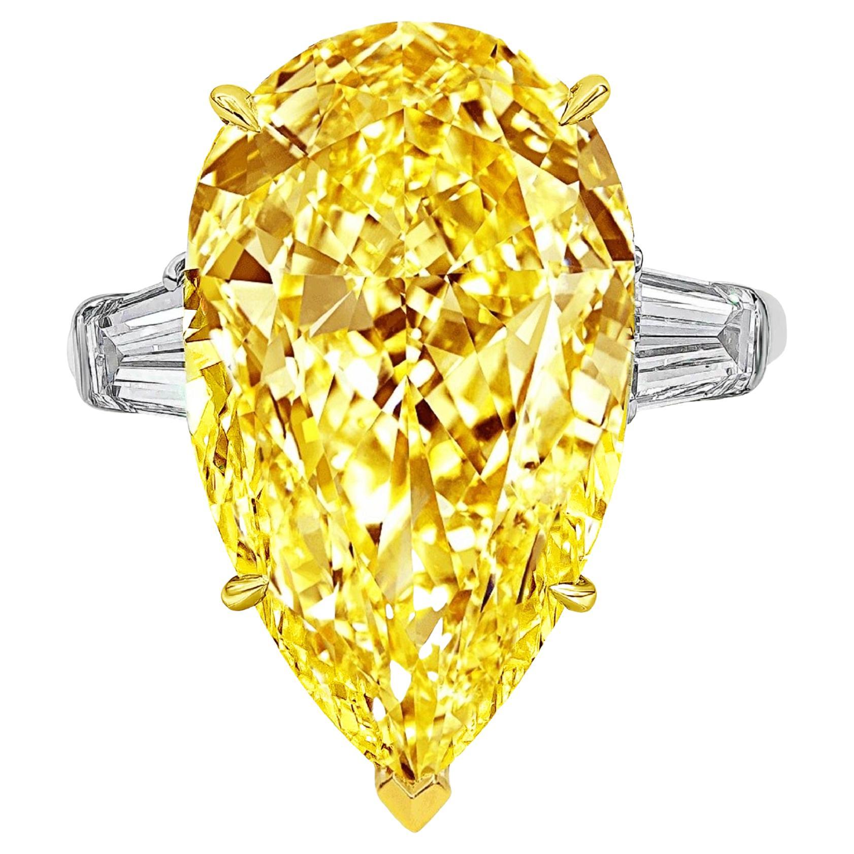 GIA Certified Fancy Intense Yellow 13.8 Carat Pear Cut Diamond Ring