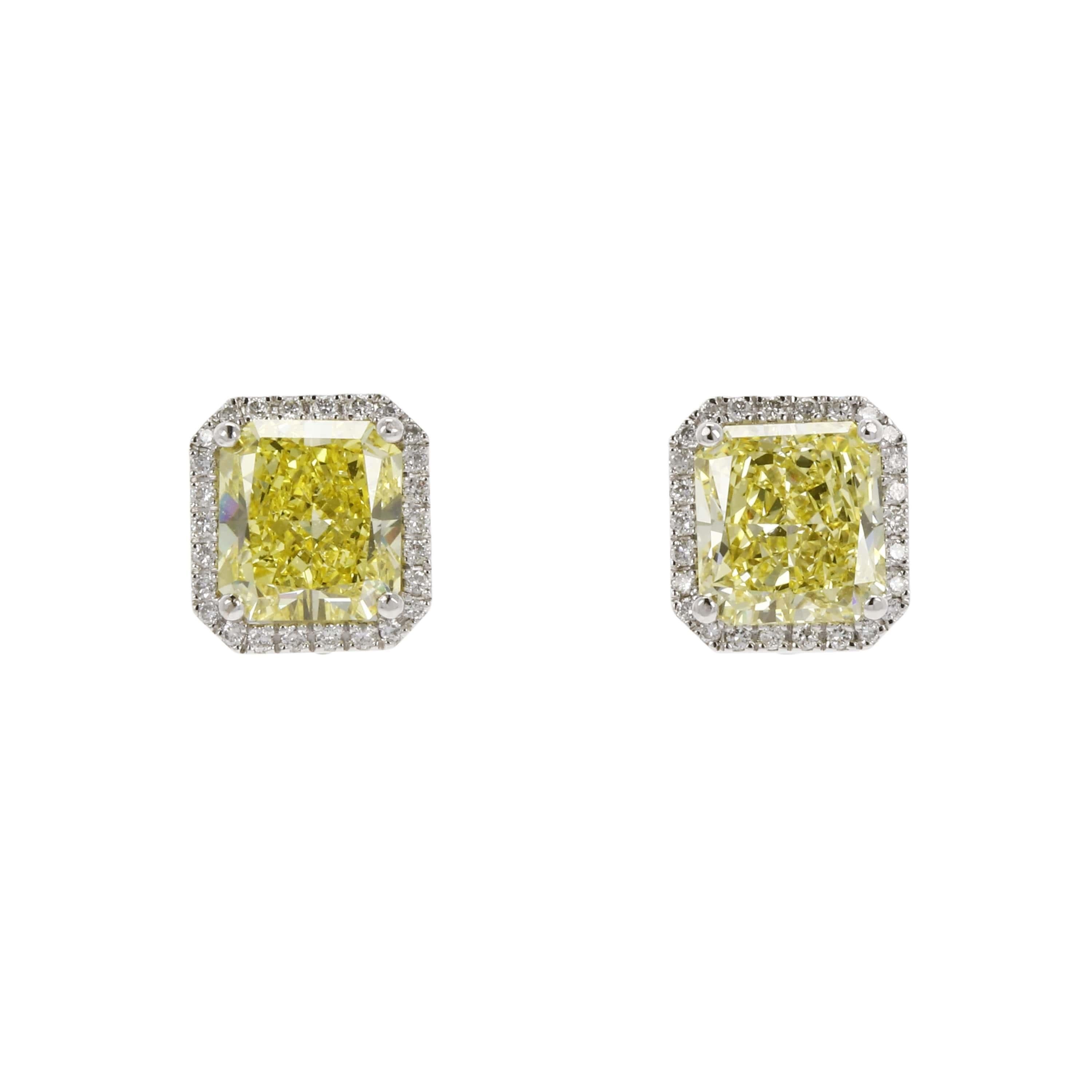 GIA Certified Fancy Intense Yellow 3.52 3.41 Carat Diamond Stud Earrings For Sale