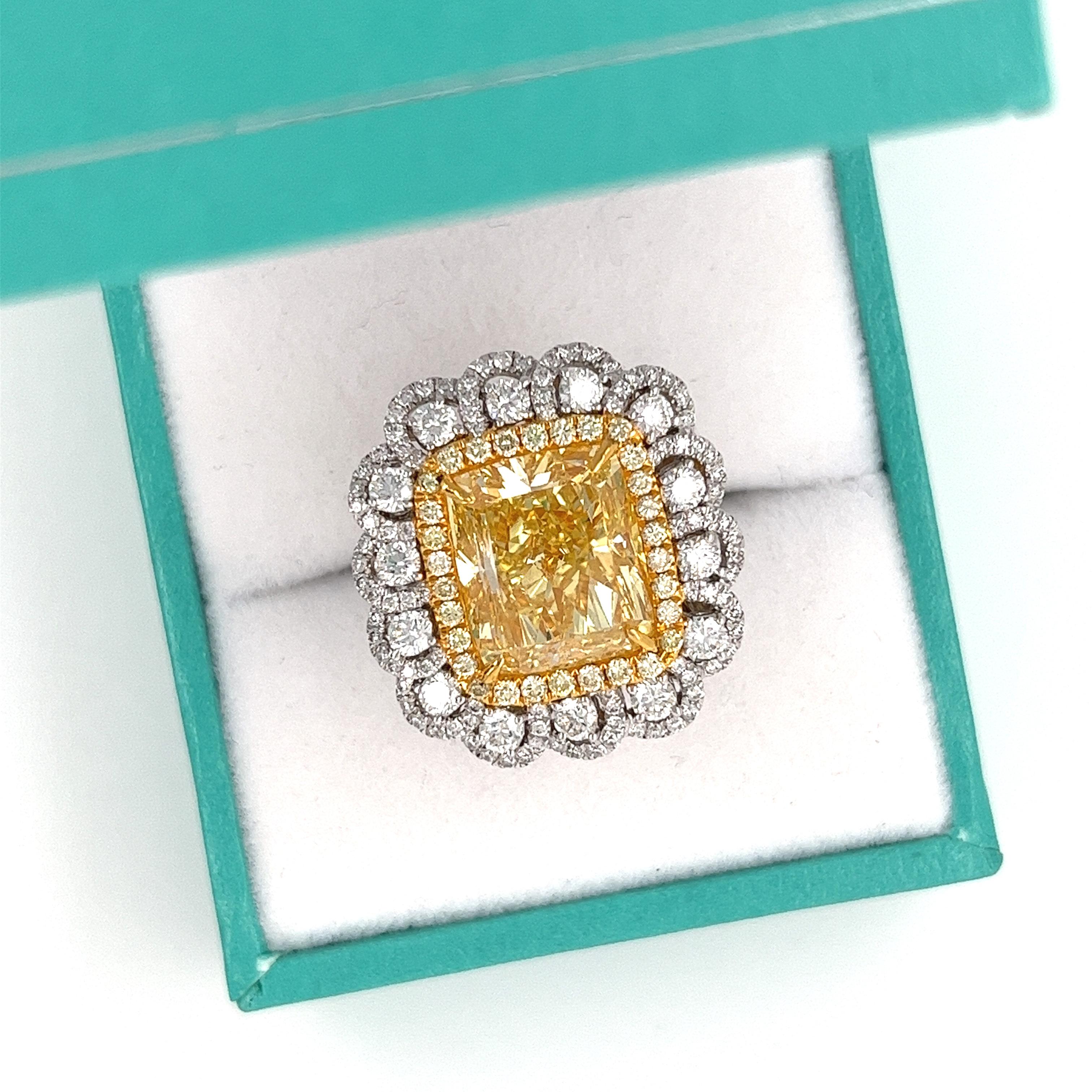 Art Nouveau GIA Certified Fancy Intense Yellow 7 Carat Radiant Cut Diamond Ring in 18k Gold For Sale