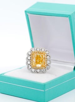 GIA Certified Fancy Intense Yellow 7 Carat Radiant Cut Diamond Ring in 18k Gold