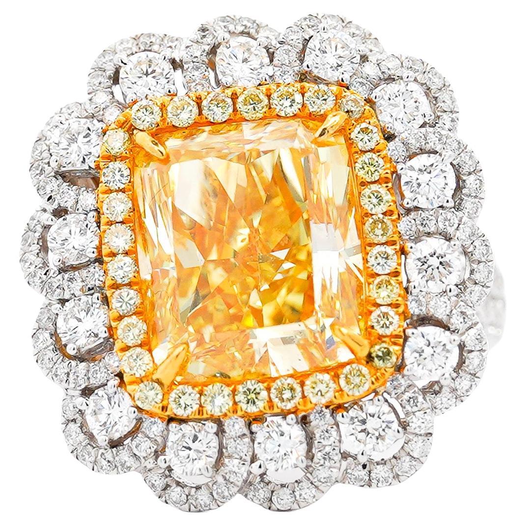 GIA Certified Fancy Intense Yellow 7 Carat Radiant Cut Diamond Ring in 18k Gold For Sale