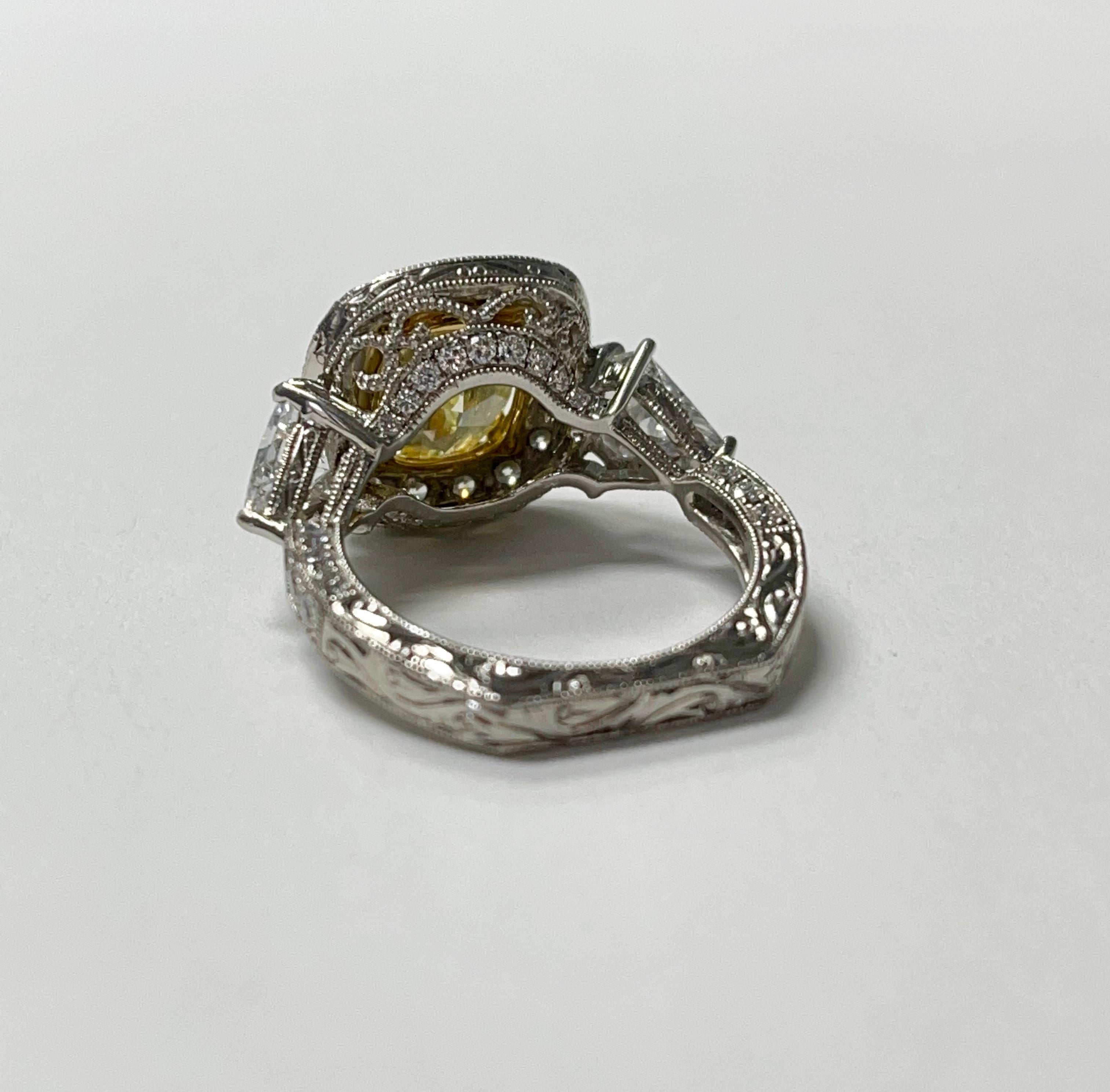 GIA Certified Fancy Intense Yellow Cushion and White Diamond Engagement Ring In New Condition For Sale In New York, NY