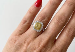GIA Certified Fancy Intense Yellow Cushion Cut Diamond Halo Engagement Ring
