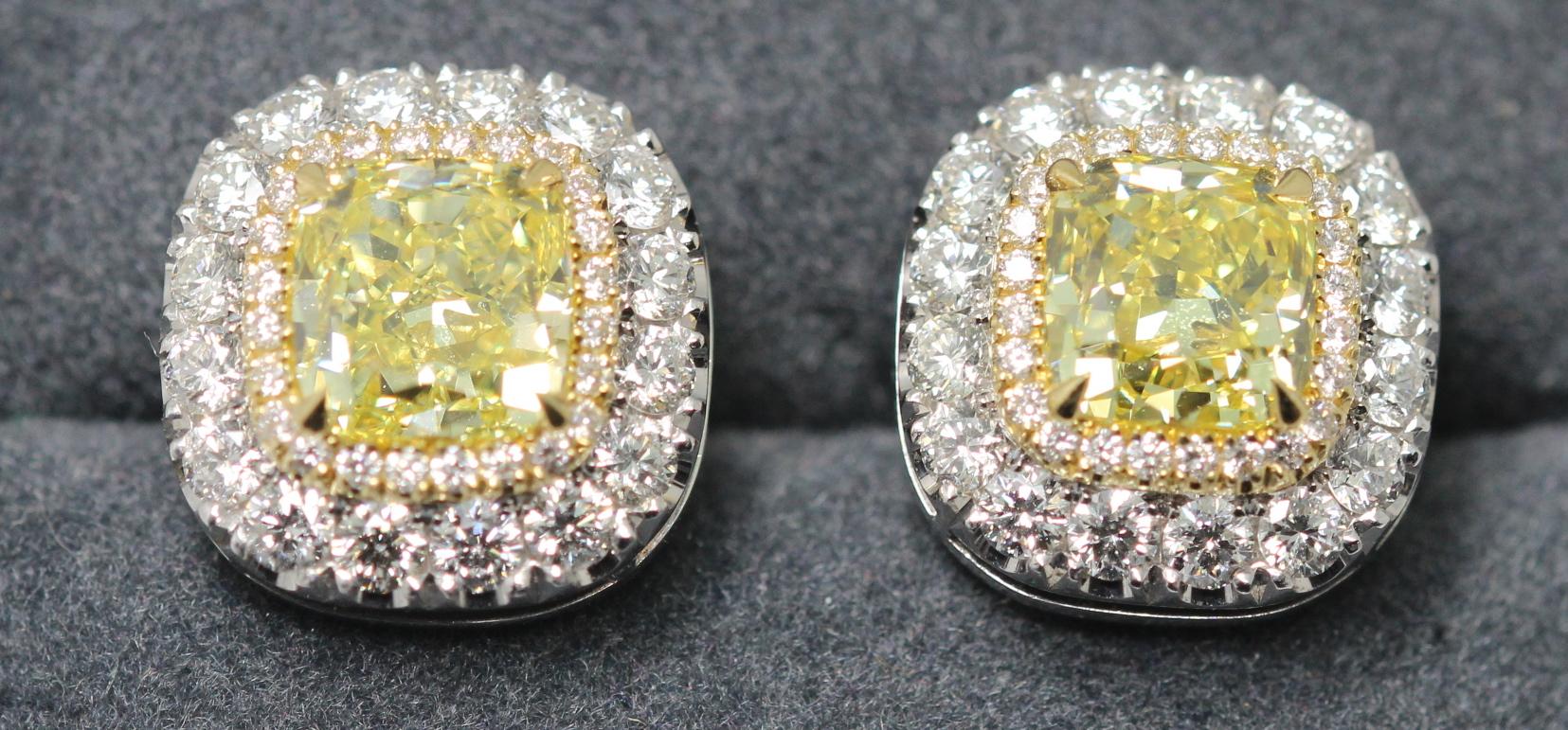Modern GIA Certified Fancy Intense Yellow Diamond Earrings Mounted in Platinum and Gold