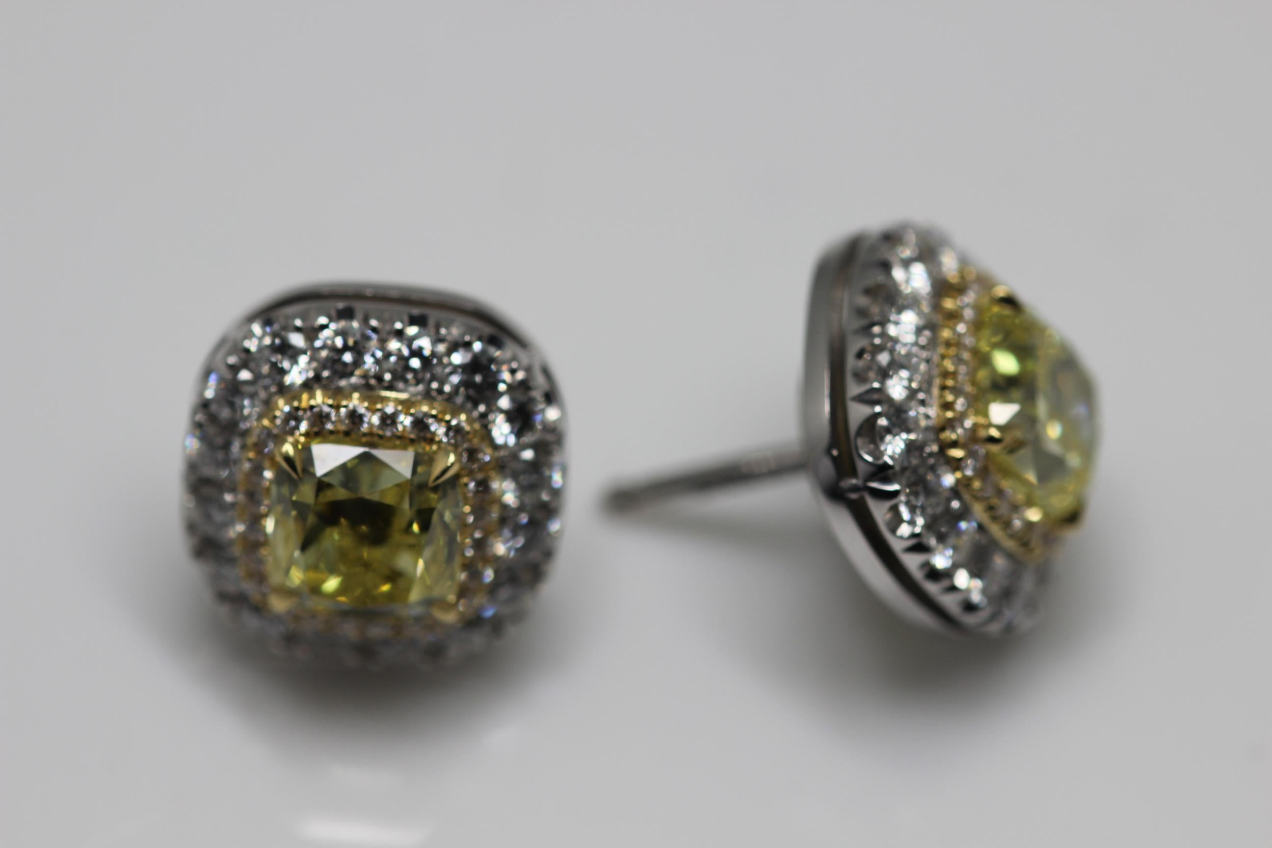 GIA Certified Fancy Intense Yellow Diamond Earrings Mounted in Platinum and Gold In New Condition In London, GB