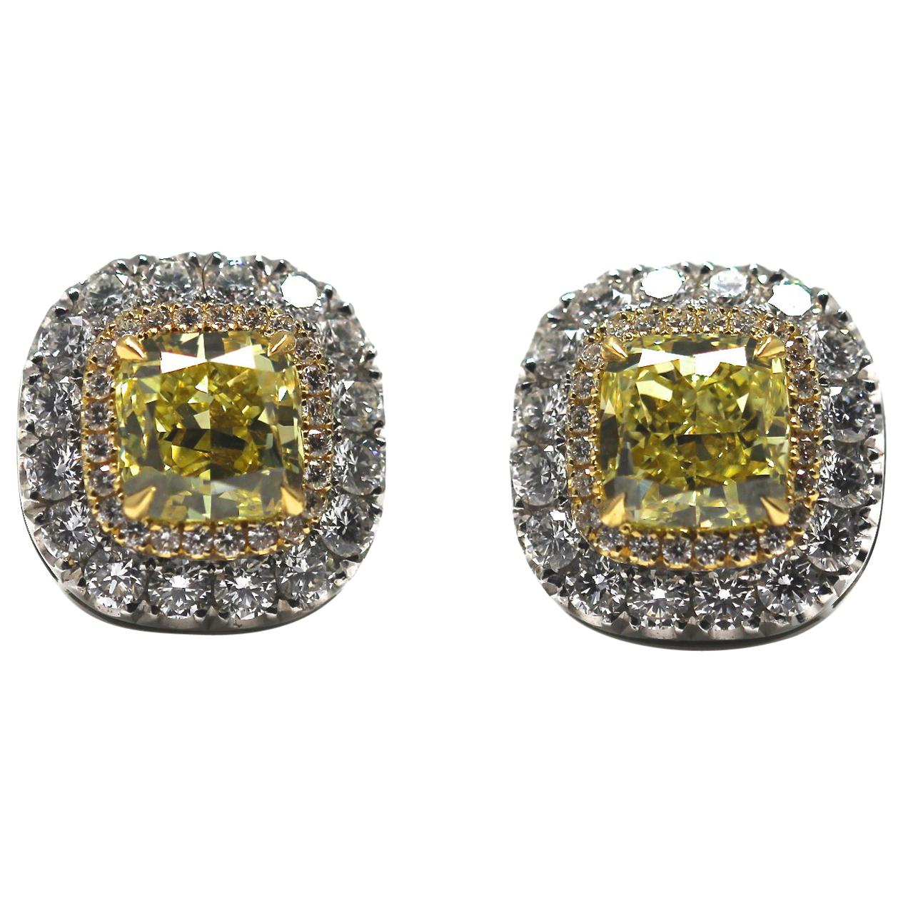GIA Certified Fancy Intense Yellow Diamond Earrings Mounted in Platinum and Gold