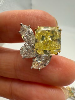 GIA certified Fancy Intense Yellow Diamond earrings VVS 12.18 carats