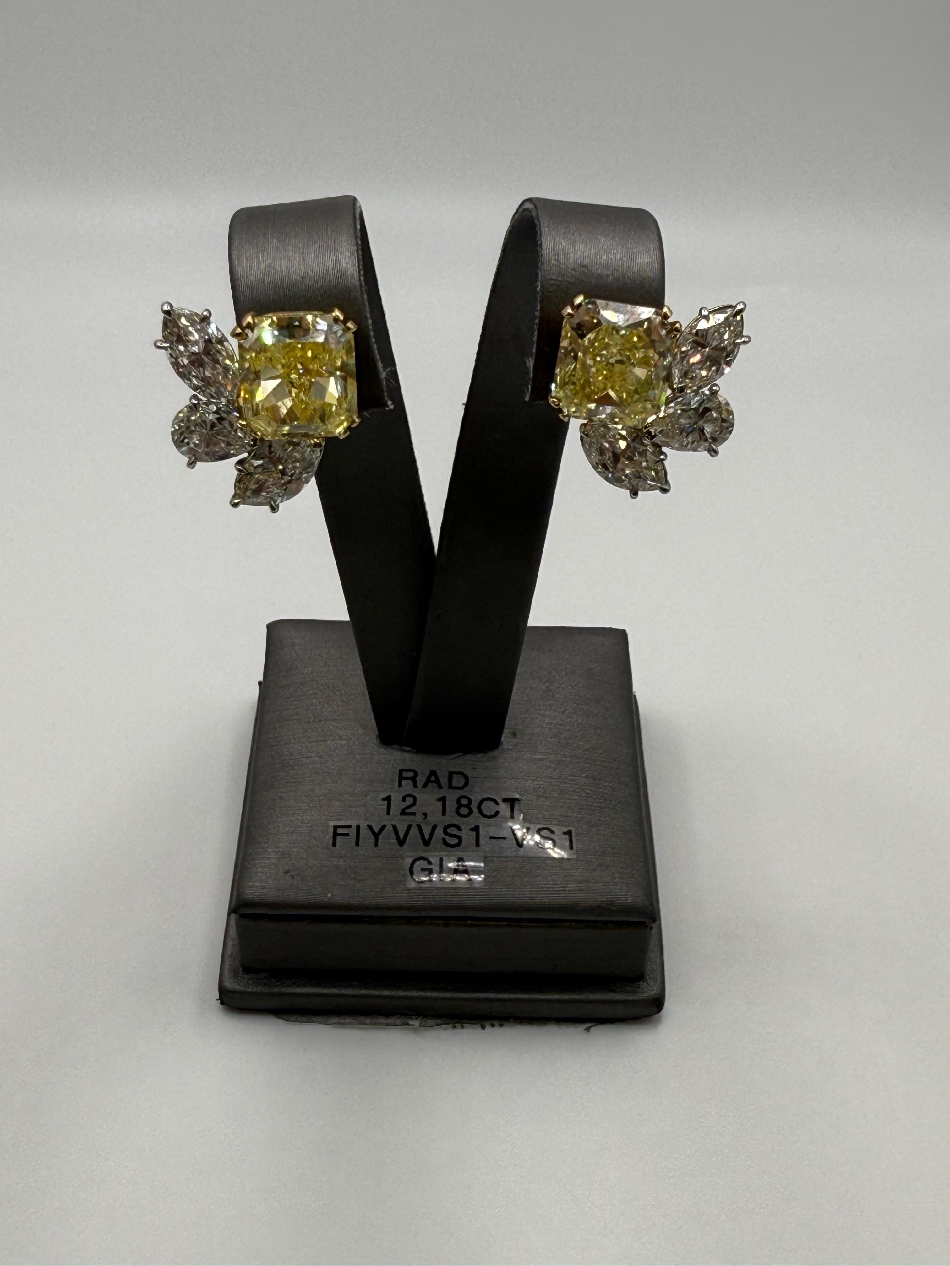 GIA certified Fancy Intense Yellow Diamond earrings VVS 12.18 carats In New Condition For Sale In Boca Raton, FL