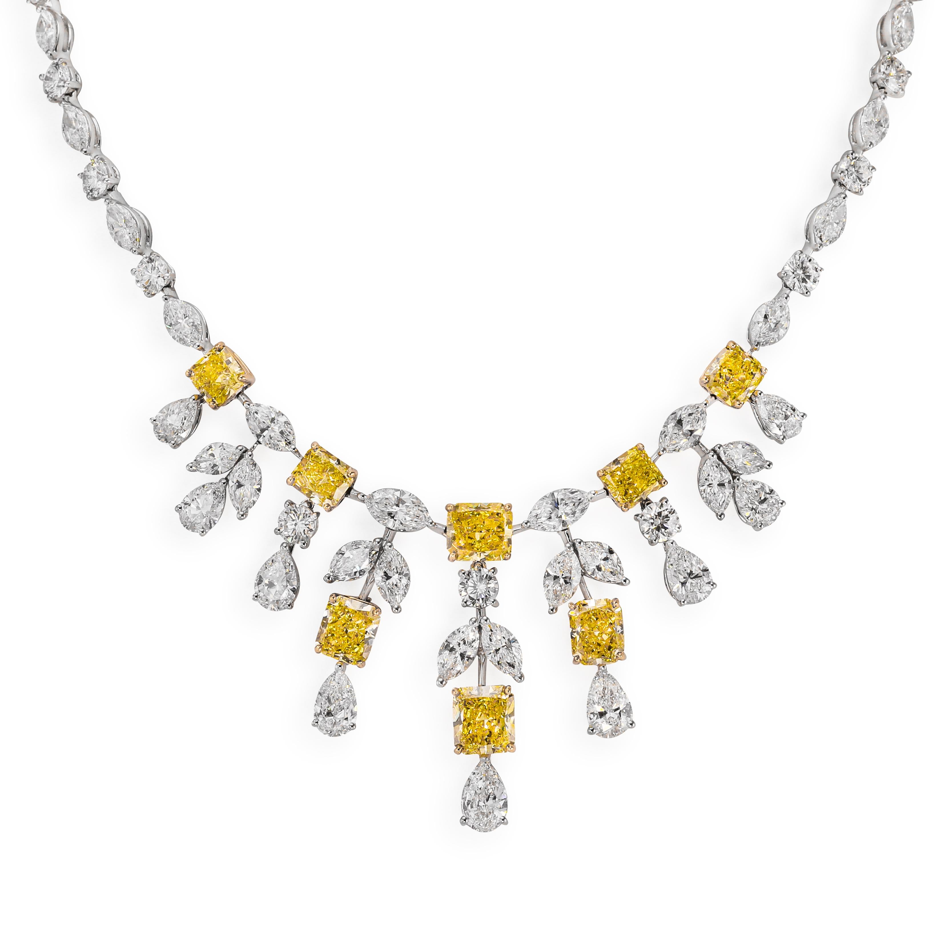 Natural Fancy Intense Yellow Diamonds (14.31 ctw.VS1-SI2) GIA
Marquise, Round Brilliant, Pear Shape Diamonds (32.60 ctw.)
Platinum/18K yellow gold