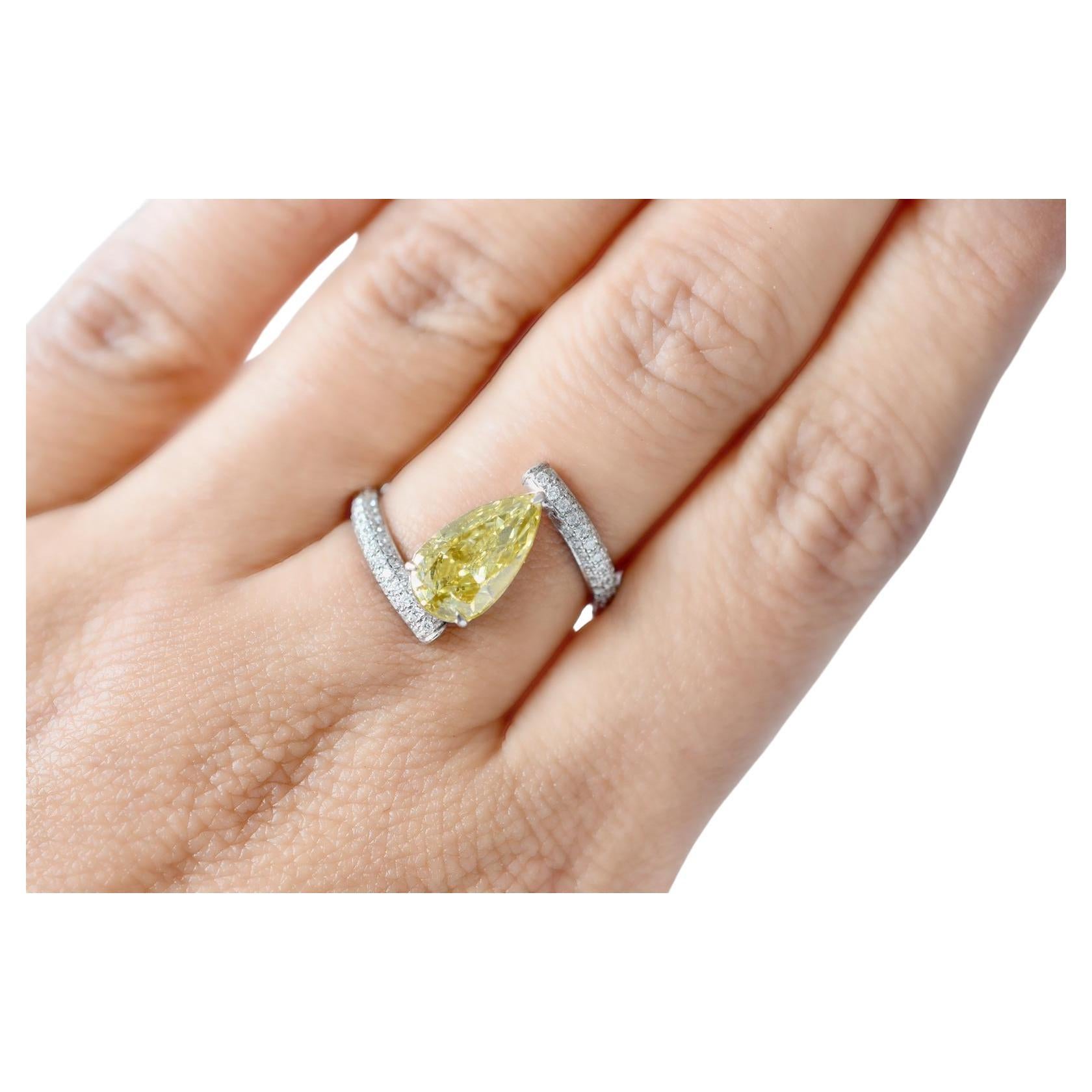 GIA Certified Fancy Intense Yellow Diamond Ring 2.01 Carat I1 Pear Shape Ring For Sale