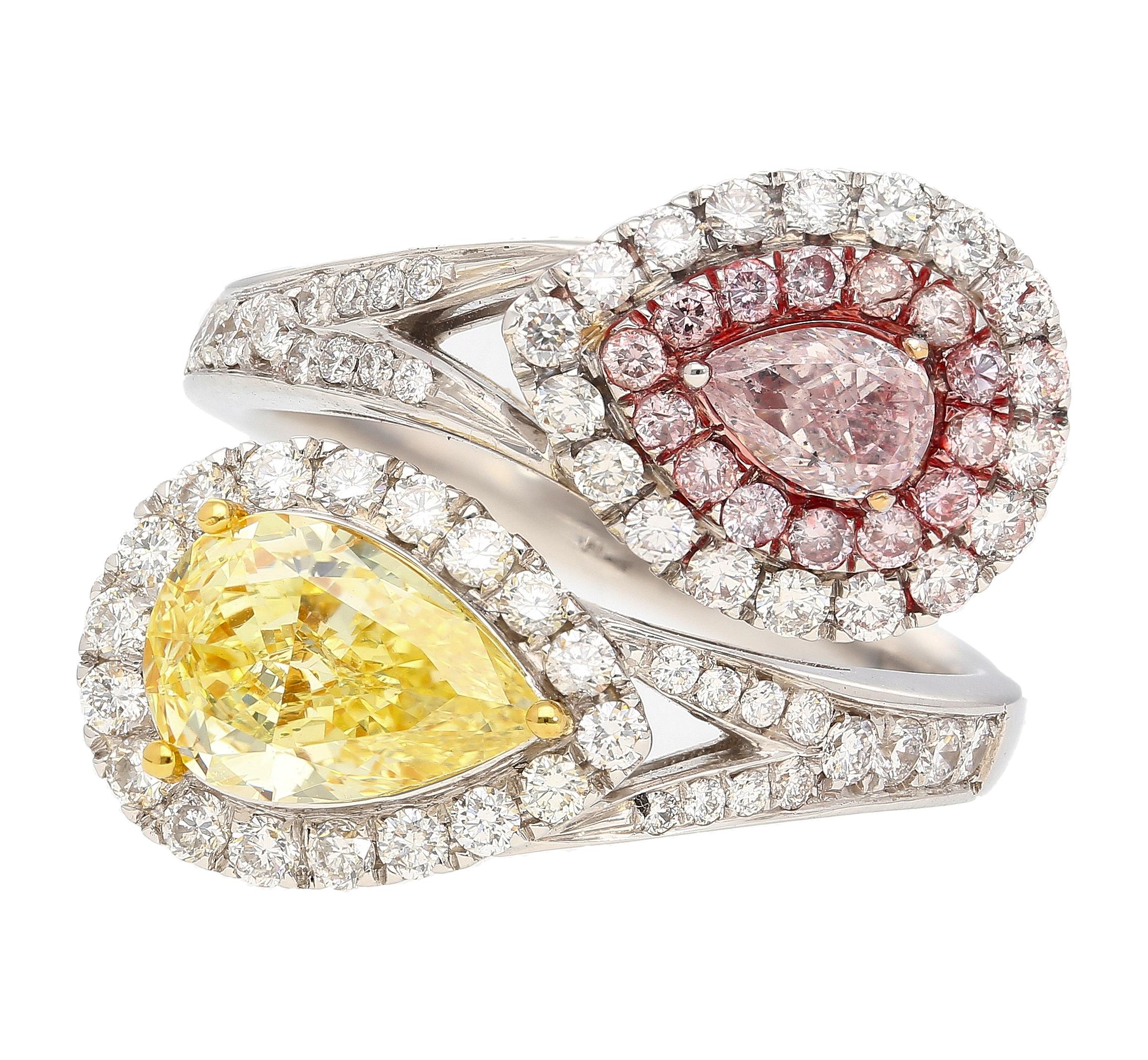 GIA Certified Fancy Intense Yellow and Fancy Light Pink Natural Diamond Toi Et Moi Ring in 18K White Gold. Complete with two GIA certificates.

The sought after Toi Et Moi ring, famous for its symbolism of two halves meeting as one. Done justice