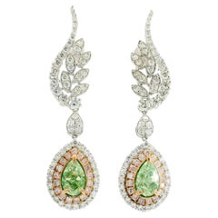 GIA Certified Fancy Light Greenish Yellow Diamonds Earrings