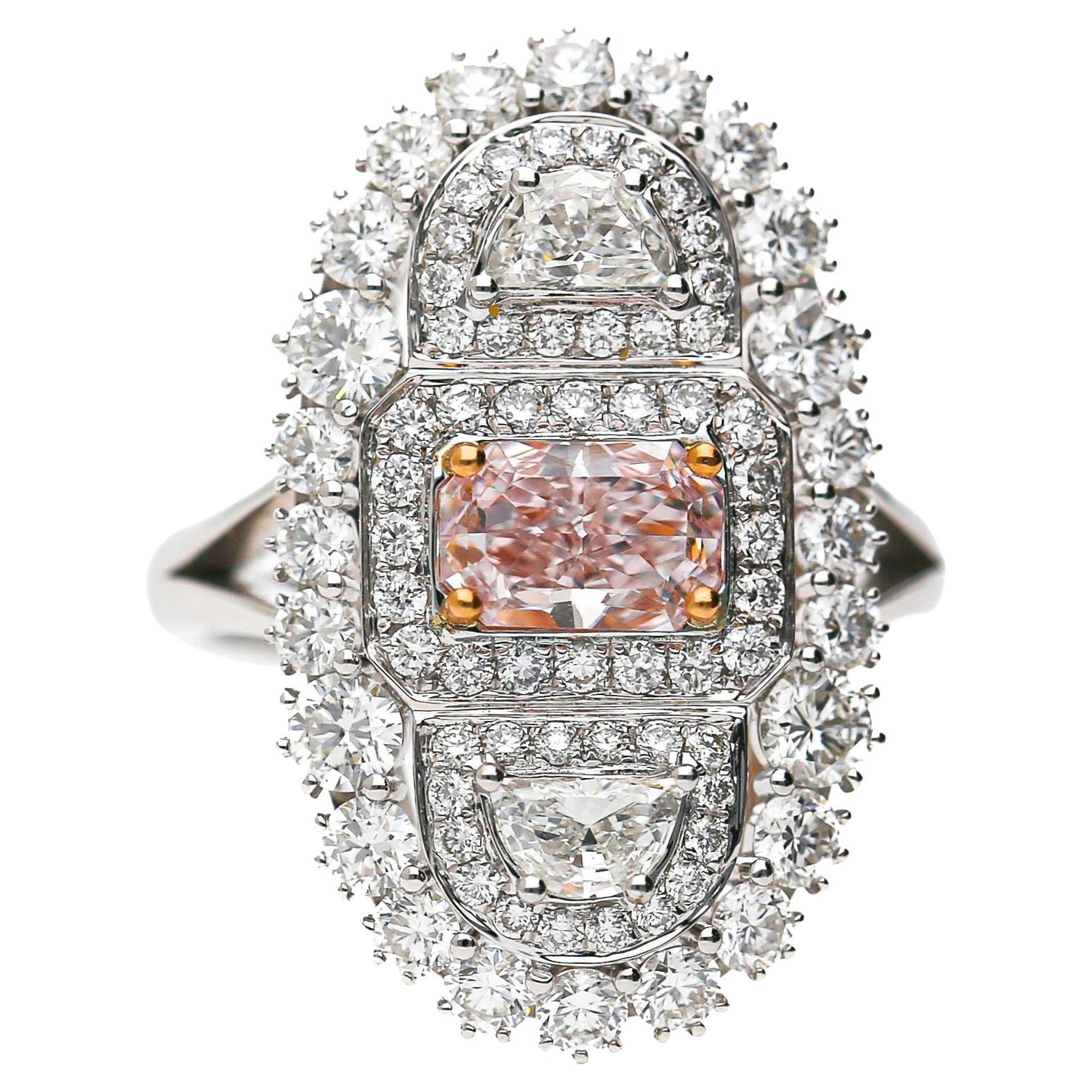 GIA Certified Fancy Light Pink Diamond Elongated Halo Cluster Ring in vendita