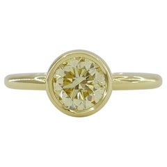 GIA Certified Fancy Light Yellow 18 Carat Yellow Gold Diamond Ring