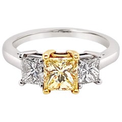 Anello con diamante giallo chiaro Fancy certificato GIA in platino