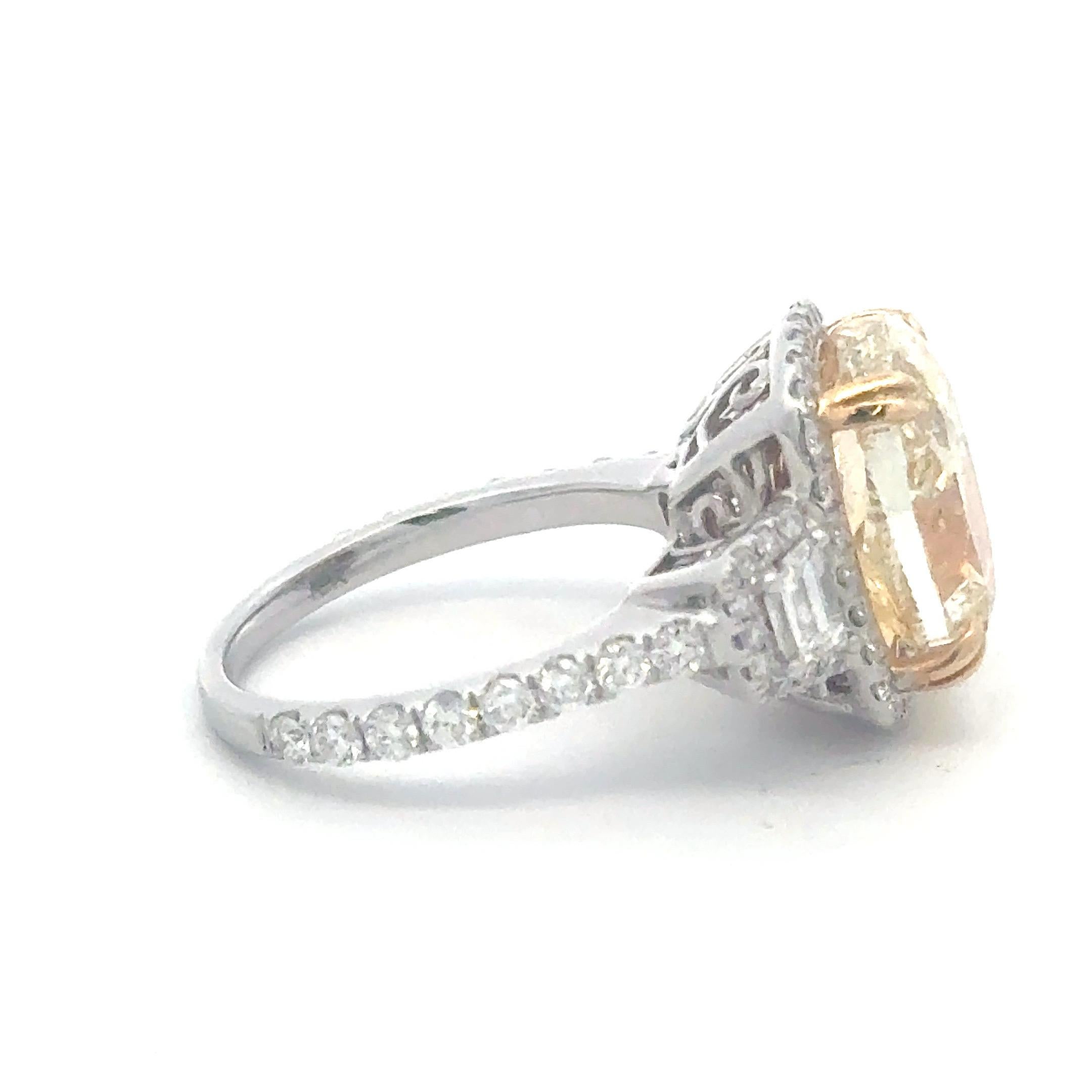 Oval Cut GIA Certified Fancy Light Yellow Oval Diamond Halo Engagement Ring 7.16 CTTW 18K For Sale