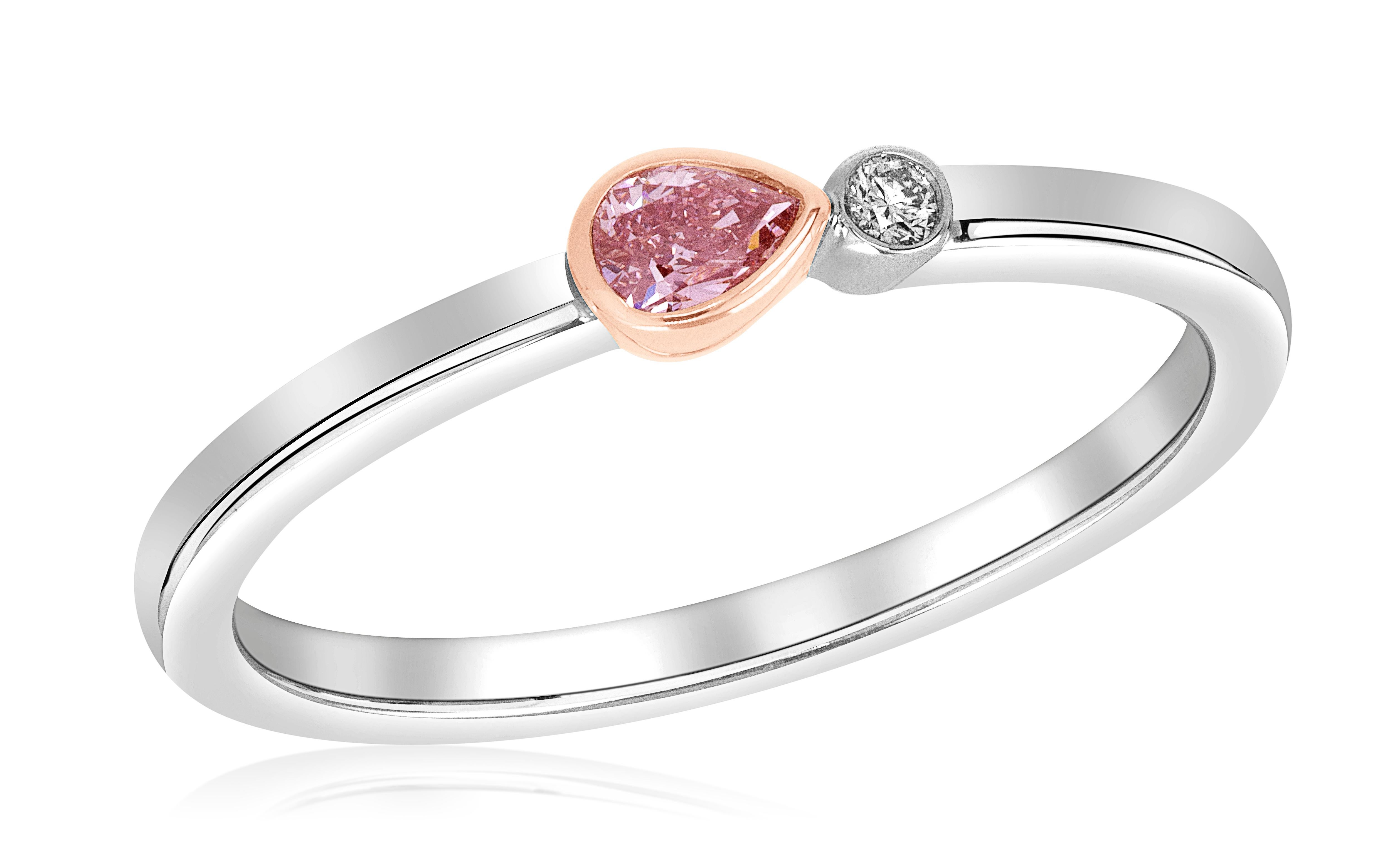 Stackable ring featuring a 0.14 carat fancy pink pear-shape diamond, GIA#: 6213437485, accented by 0.02 carats melee. Set in 18k rose and white gold. Ring size 6.5