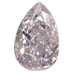 Diamante Brillante Modificado Pera Natural de 0,16 ct de color rosa violáceo fantasía certificado por el GIA