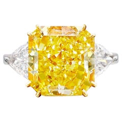 Gia Certified Fancy Vivid 4 Carat Diamond Three Stone Ring