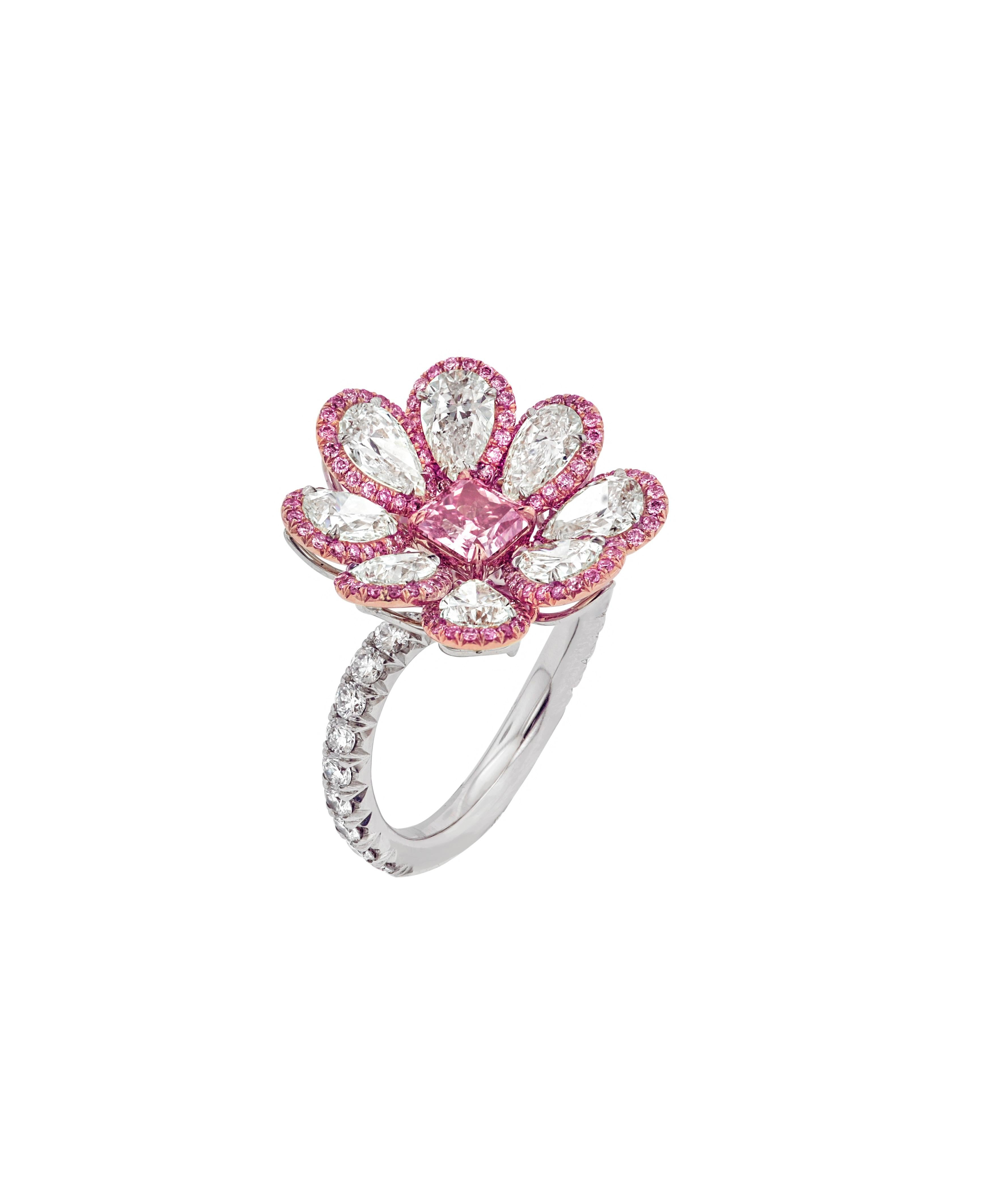 Platinum And 18kt Pink Gold Pink Diamond Ring With Center Gia Certified .80 Fancy Vivid Pink Set With 8 White Pear Shape Diamonds 4.05 Ct And Surrounded By Micropave Pink Diamonds 0.70ct.