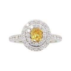 GIA Certified Fancy Vivid Yellow-Orange Diamond Double Halo Ring