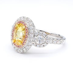 GIA Certified Fancy Vivid Yellow Oval Diamond 2.04 Carat TW Gold Cocktail Ring