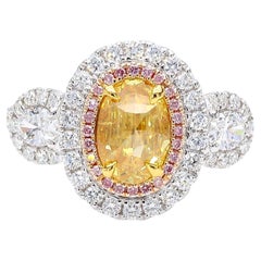 GIA Certified Fancy Vivid Yellow Oval Diamond 2.04 Carat TW Gold Cocktail Ring