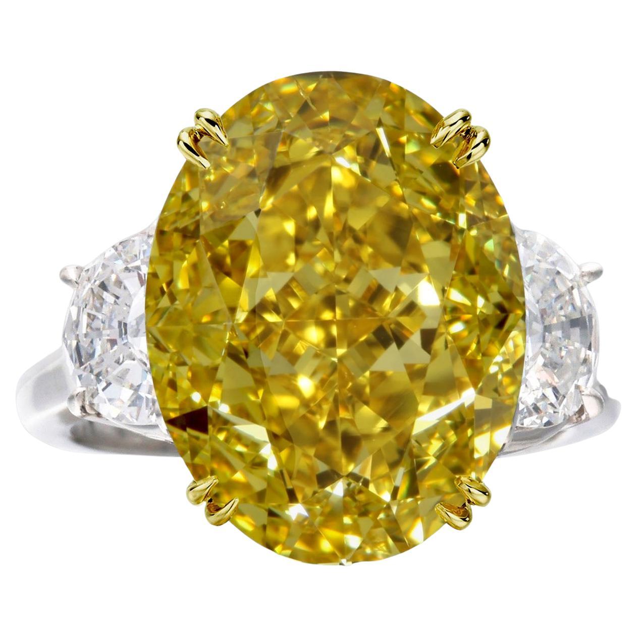 GIA Certified Fancy Vivid Yellow Oval Diamond Solitaire Ring For Sale