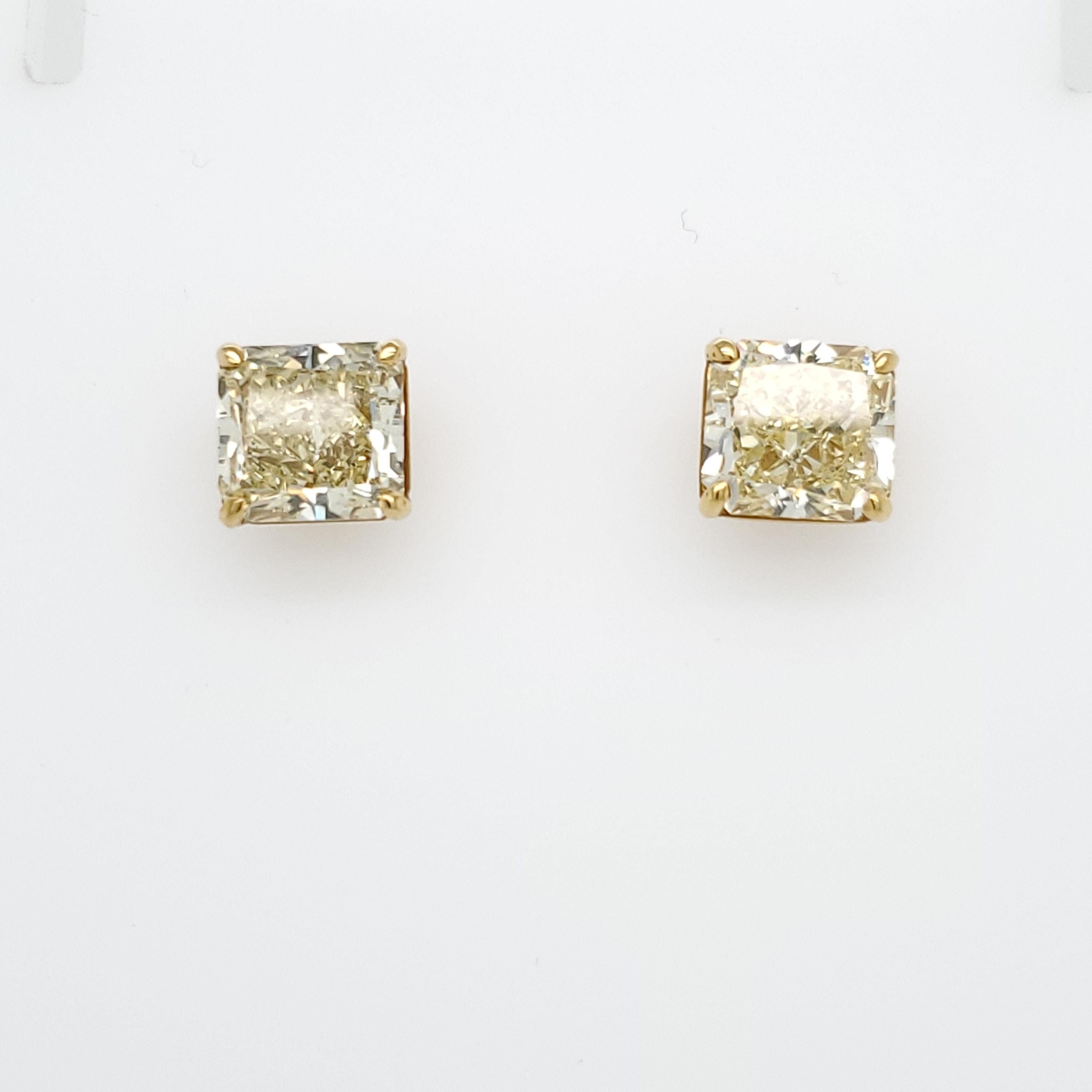 GIA Certified Fancy Yellow 10.31 Carat Radiant Cut Earrings In New Condition In New York, NY