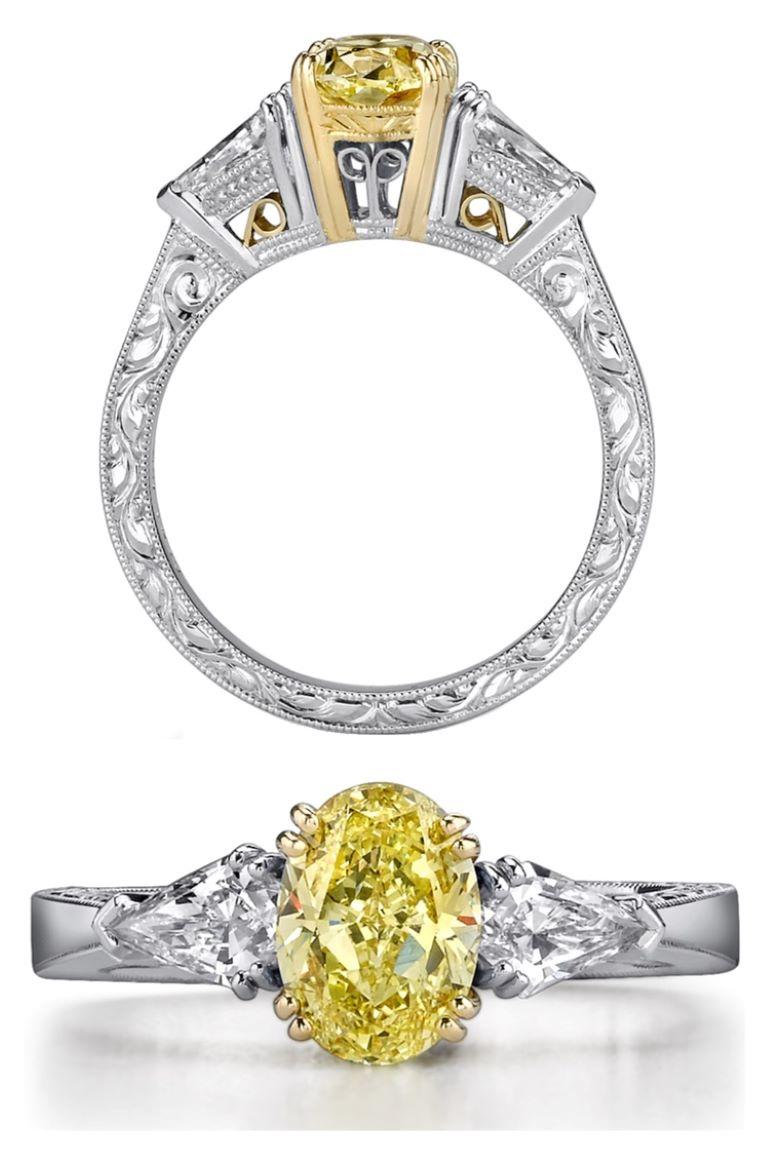 Oval Cut GIA Certified, Fancy Yellow 1.18 Ct, Platinum, Two .75ct Kite Diamonds