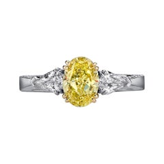 GIA Certified, Fancy Yellow 1.18 Ct, Platinum, Two .75ct Kite Diamonds