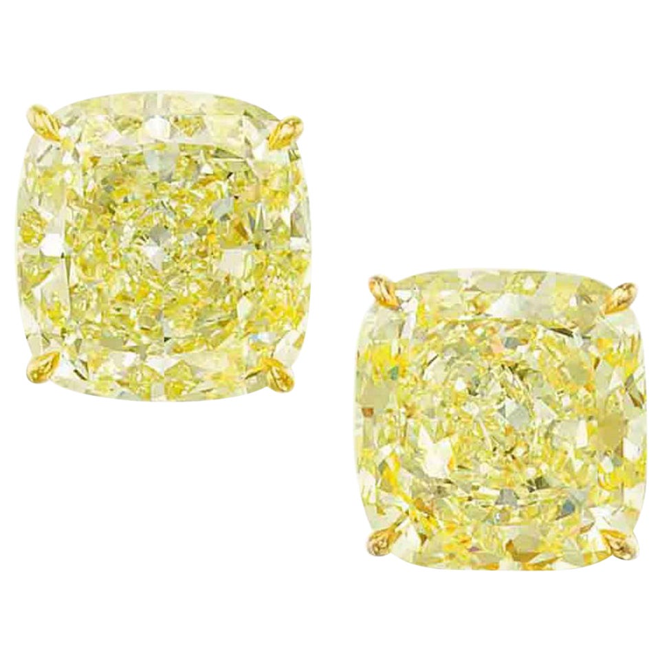 GIA Certified Fancy Yellow 2 Carat Cushion Cut Diamond Studs IF/VVS1 For Sale