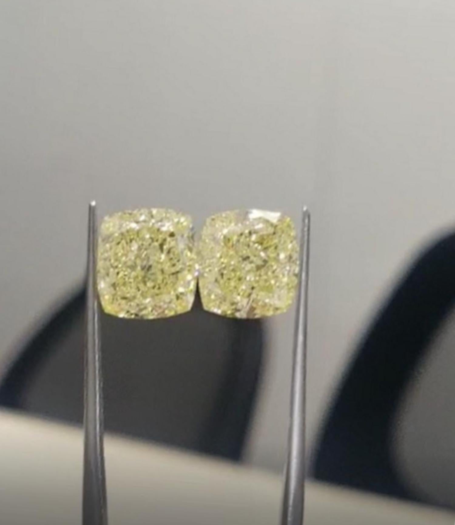 GIA Certifed Fancy Yellow 4 Carat Cushion Cut Diamond Studs
