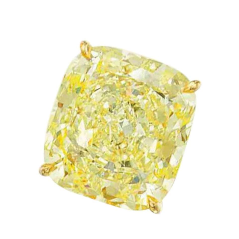 Contemporary GIA Certified Fancy Yellow 4 Carat Cushion Cut Diamond Studs For Sale