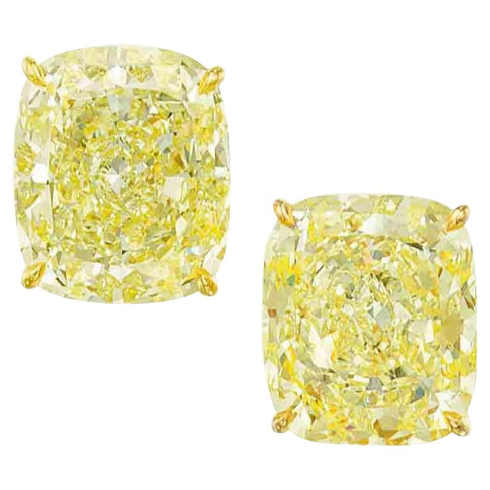 GIA Certified Fancy Yellow 4 Carat Cushion Cut Diamond Studs